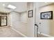 Upstairs hallway with carpet, mirror, and access to bedrooms at 102 S Moody Ave # 3, Tampa, FL 33609