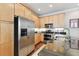 Kitchen boasts stainless steel appliances and light wood cabinets at 102 S Moody Ave # 3, Tampa, FL 33609