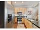 Stainless steel appliances and light wood cabinets in this kitchen at 102 S Moody Ave # 3, Tampa, FL 33609