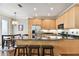 Updated kitchen with stainless steel appliances and a large island at 102 S Moody Ave # 3, Tampa, FL 33609