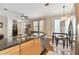 Eat-in kitchen with island, stainless steel appliances, and hardwood floors at 102 S Moody Ave # 3, Tampa, FL 33609
