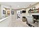 Home office with a desk, computer, and view of a bedroom at 102 S Moody Ave # 3, Tampa, FL 33609