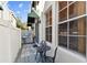 Cozy patio with grill and bistro table, perfect for outdoor dining at 102 S Moody Ave # 3, Tampa, FL 33609