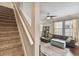 Carpeted staircase leading to the upper level of the home at 102 S Moody Ave # 3, Tampa, FL 33609