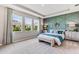 Spacious bedroom with large windows and stylish decor at 16817 Harvest Moon Way, Lakewood Ranch, FL 34211