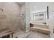 Spa-like bathroom with a large walk-in shower and a soaking tub at 1688 Watermark Ne Cir # 1688, St Petersburg, FL 33702