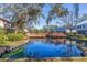 Tranquil pond in a waterfront community with gazebo and boardwalk at 1688 Watermark Ne Cir # 1688, St Petersburg, FL 33702