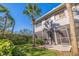 Ground level view of the condo building with a screened patio at 1688 Watermark Ne Cir # 1688, St Petersburg, FL 33702