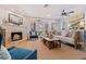 Spacious living room with fireplace and large windows at 1688 Watermark Ne Cir # 1688, St Petersburg, FL 33702
