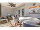 Outdoor screened patio with table and chairs, perfect for dining al fresco at 1688 Watermark Ne Cir # 1688, St Petersburg, FL 33702