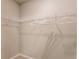 Walk in closet with wire shelving and ample hanging space at 174 Green Oak Park, Rotonda West, FL 33947