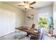 Home office with built-in desk and large window at 174 Green Oak Park, Rotonda West, FL 33947