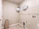 Laundry room with shelving and built-in storage at 174 Green Oak Park, Rotonda West, FL 33947