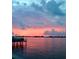 Evening sunset view from a waterfront dock at 22 Paradise Ln, Treasure Island, FL 33706