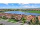 Aerial view of lakefront homes and community at 23503 Waverly Cir, Venice, FL 34293