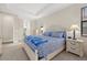 Primary suite with king bed and en-suite bathroom at 23503 Waverly Cir, Venice, FL 34293