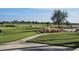 Golf course with a scenic walking path at 23503 Waverly Cir, Venice, FL 34293