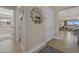 Bright hallway with access to living areas and bedrooms at 23503 Waverly Cir, Venice, FL 34293