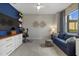 Functional home office with built-in desk and comfortable seating at 23503 Waverly Cir, Venice, FL 34293