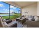 Relaxing screened lanai overlooking the lake at 23503 Waverly Cir, Venice, FL 34293