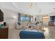 Living area with sectional sofa, and access to a relaxing patio at 23503 Waverly Cir, Venice, FL 34293