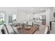 Open concept dining room with modern table and view into the kitchen at 31526 Ancient Sage Rd, Wesley Chapel, FL 33545