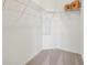 Large walk-in closet with wire shelving for ample storage at 31526 Ancient Sage Rd, Wesley Chapel, FL 33545