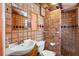 Charming bathroom with terracotta tile and a walk-in shower at 5021 24Th S Ave, Gulfport, FL 33707