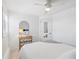 Bright bedroom with a queen bed and ceiling fan at 5021 24Th S Ave, Gulfport, FL 33707