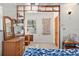 Bedroom with wicker furniture and built-in shelving at 5021 24Th S Ave, Gulfport, FL 33707