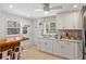 Modern kitchen with white cabinets and wood countertop at 5021 24Th S Ave, Gulfport, FL 33707
