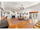 Bright living room with hardwood floors, a fireplace, and views into other rooms at 5021 24Th S Ave, Gulfport, FL 33707