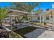 Outdoor patio area with covered seating and gravel at 5021 24Th S Ave, Gulfport, FL 33707