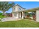 Newly renovated home with modern facade and manicured lawn at 5421 7Th N Ave, St Petersburg, FL 33710