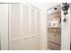 View of bathroom from hallway, showing updated vanity and flooring at 5501 80Th N St # 214, St Petersburg, FL 33709