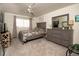 Bedroom with gray dresser, full bed, and carpet at 5501 80Th N St # 214, St Petersburg, FL 33709