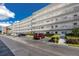 Three-story condo building with ample parking at 5501 80Th N St # 214, St Petersburg, FL 33709