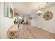 Bright dining room with hardwood floors and view of living room at 5501 80Th N St # 214, St Petersburg, FL 33709