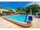 Community pool with accessible lift at 5501 80Th N St # 214, St Petersburg, FL 33709