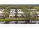 Aerial view of townhouses and canal at 6262 93Rd N Ter # 3904, Pinellas Park, FL 33782