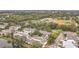 Aerial view of a townhome community close to community parks, a canal and nearby roadways at 6262 93Rd N Ter # 3904, Pinellas Park, FL 33782