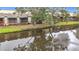 Scenic view of the home's backyard pond and fountain at 6262 93Rd N Ter # 3904, Pinellas Park, FL 33782