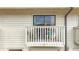 The outdoor balcony features white railings, views of the neighborhood, and potted plants for a cozy touch at 6262 93Rd N Ter # 3904, Pinellas Park, FL 33782