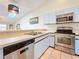 Kitchen with stainless steel appliances and light blue cabinets at 6262 93Rd N Ter # 3904, Pinellas Park, FL 33782
