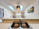 Modern kitchen features stainless steel appliances and a double sink at 6262 93Rd N Ter # 3904, Pinellas Park, FL 33782