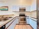 This well-maintained kitchen is equipped with stainless steel appliances and ample counter space at 6262 93Rd N Ter # 3904, Pinellas Park, FL 33782