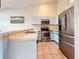 Well-equipped kitchen features stainless steel appliances and plenty of counter space at 6262 93Rd N Ter # 3904, Pinellas Park, FL 33782