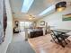 Open floor plan features a bright living area with skylights and access to the screened patio at 6262 93Rd N Ter # 3904, Pinellas Park, FL 33782