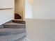 Carpeted staircase leading to the next floor, showcasing the home's interior design and layout at 6262 93Rd N Ter # 3904, Pinellas Park, FL 33782