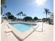 Inviting community swimming pool with a separate spa at 6262 93Rd N Ter # 3904, Pinellas Park, FL 33782